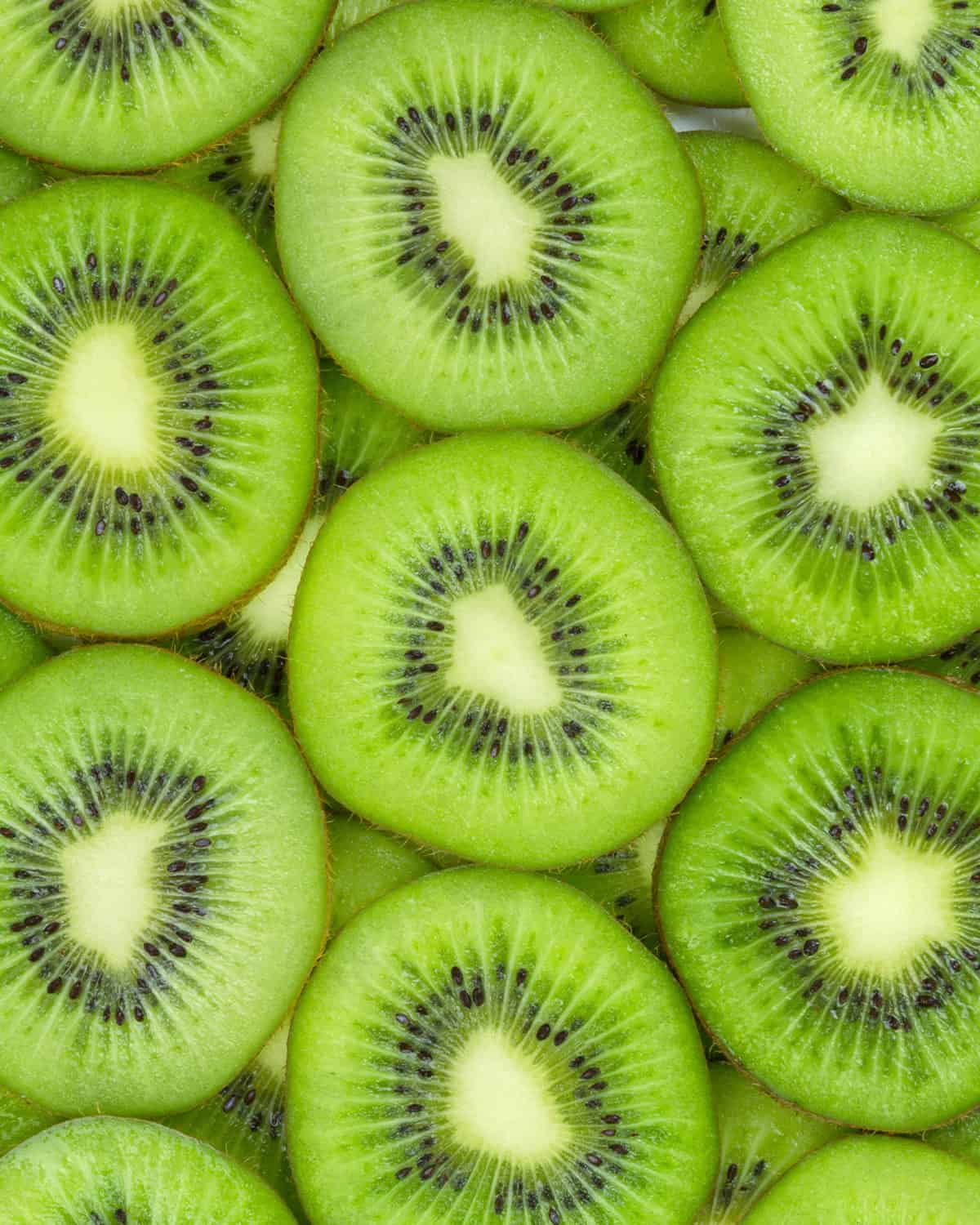 seasonal kiwi fruits, sliced in half and arranged decoratively.