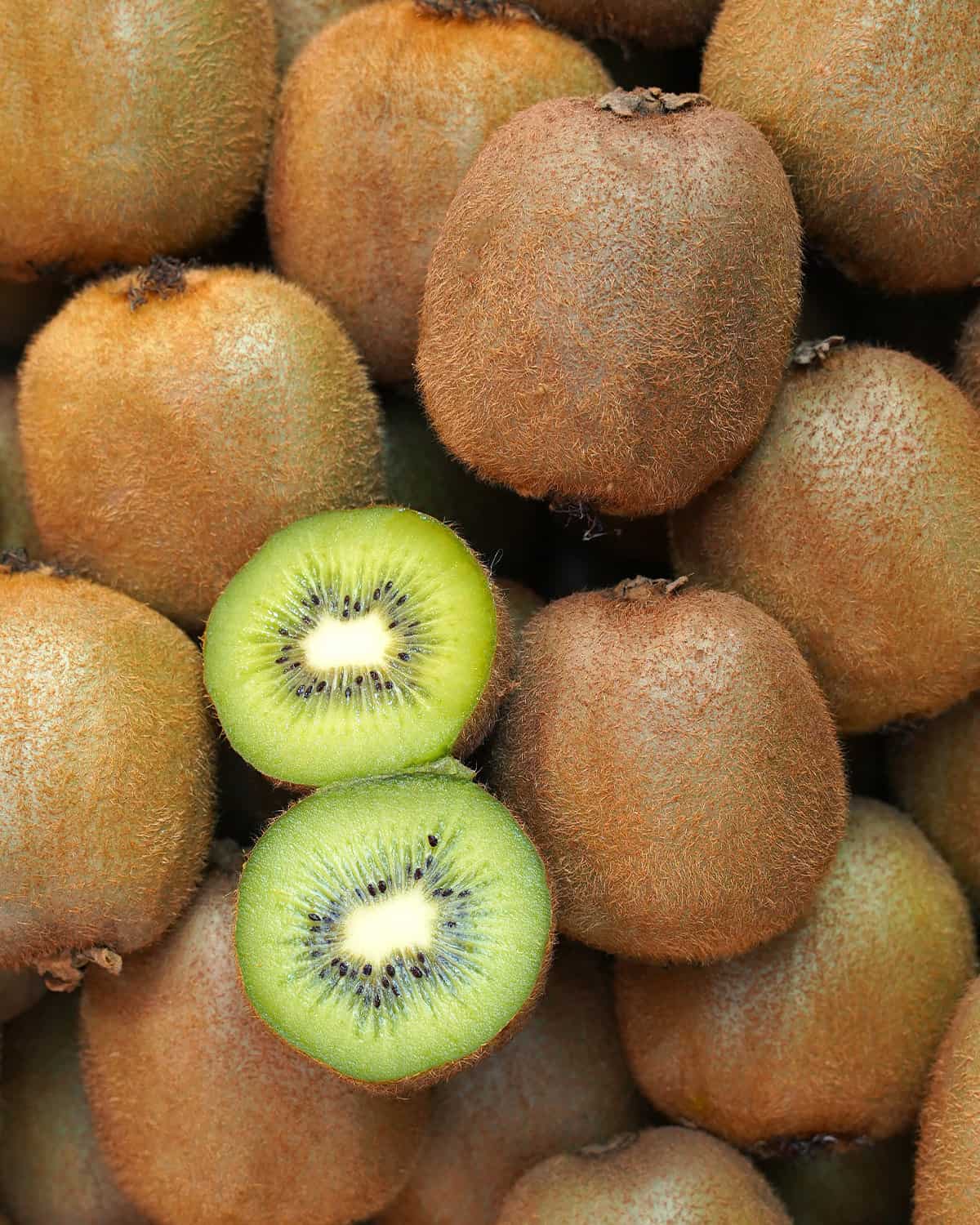 Kiwifruit, a seasonal fruit available in the United States in October, fills a photo frame.