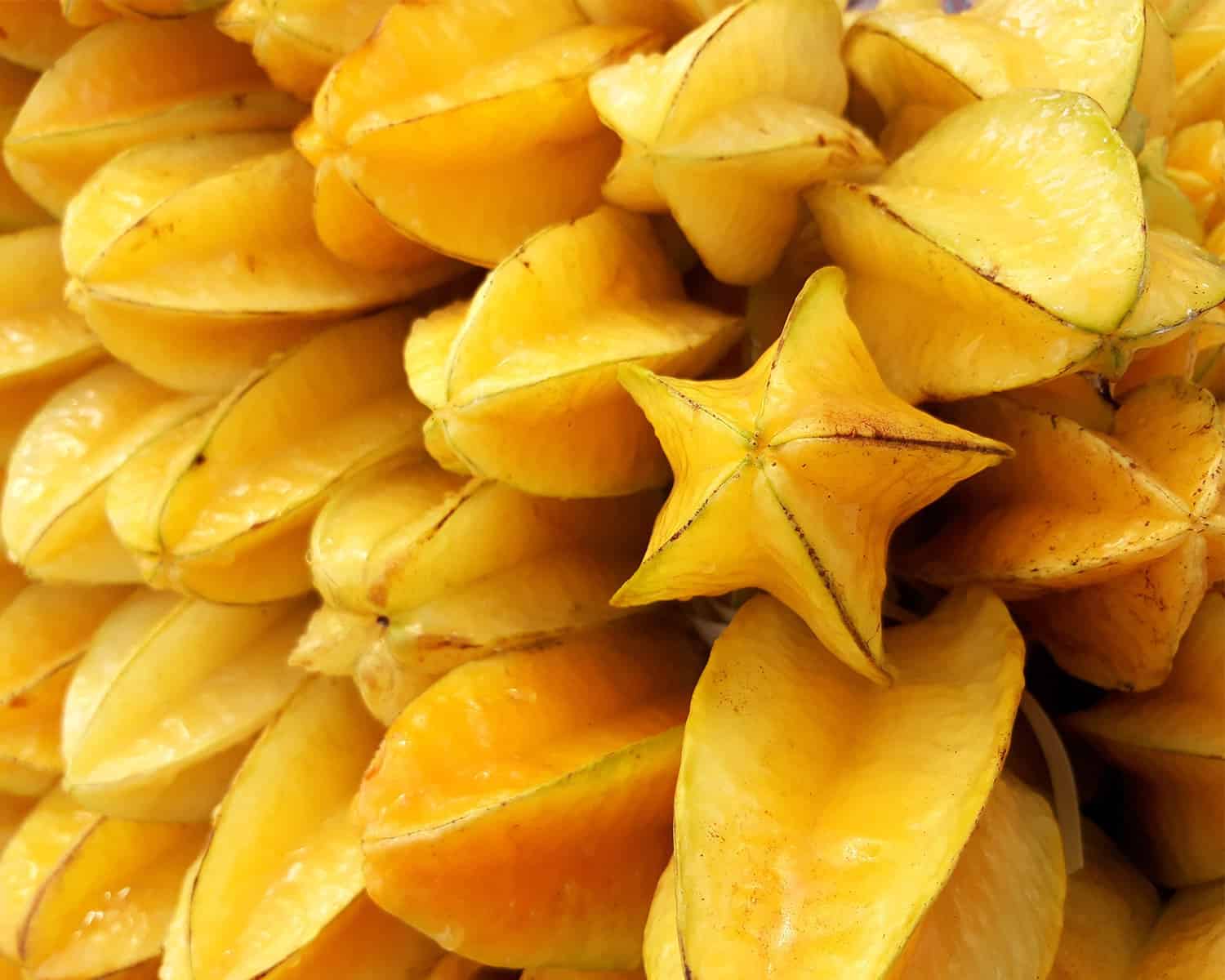an image of a bunch of starfruit, a seasonal crop in February.