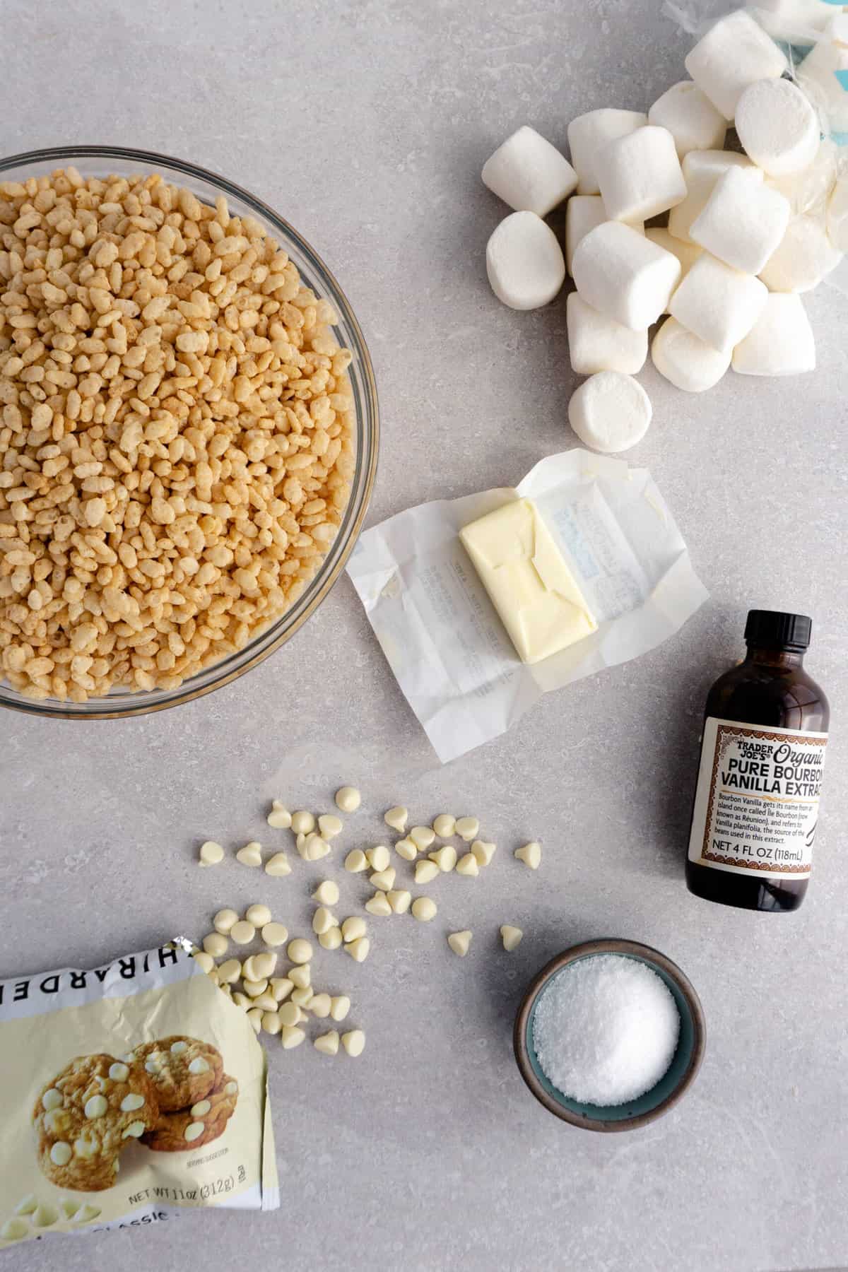 Ingredients to make copycat Disney rice krispie treats sit on a countertop ready to be used.