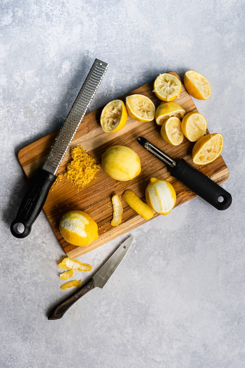 showcasing alternate methods of zesting lemons using a microplane, a pairing knife, or a vegetable peeler.