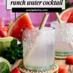 A glass of refreshing watermelon ranch water cocktail with ice, a bamboo straw, and a watermelon slice garnish sits on a coaster. Fresh limes and watermelon are nearby. Summery pink background and text describe this fun tequila drink.