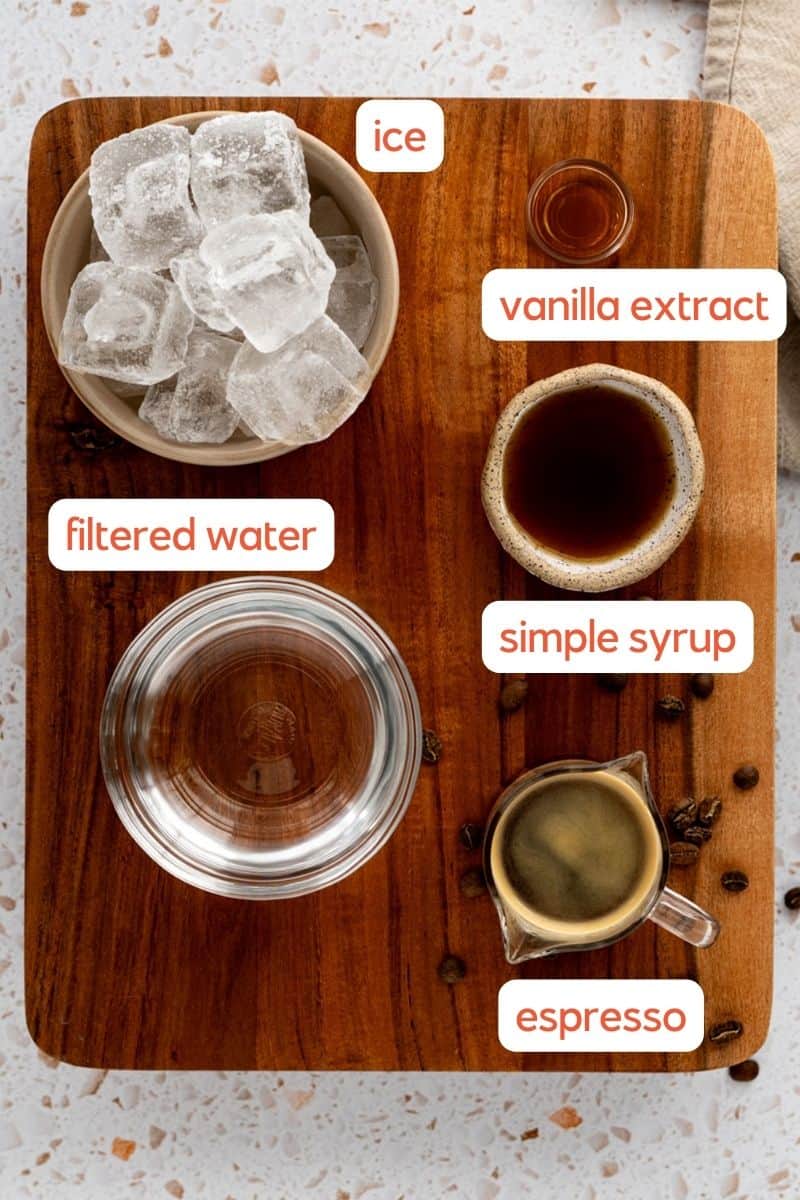 a labeled ingredient shot of what ingredients are used to make an espresso martini mocktail.