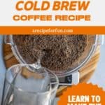A hand pours water from a glass pitcher into a container filled with ground coffee on a scale. Text above and below promotes a Cold Brew Coffee Recipe and shows how to make cold brew to help you learn to make the best coffee!.