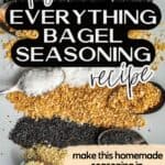 Five spoons with ingredients for everything bagel seasoning—black sesame seeds, dried onion, salt, dried garlic, and white sesame seeds—lined up on a gray surface with bold text about a homemade recipe.